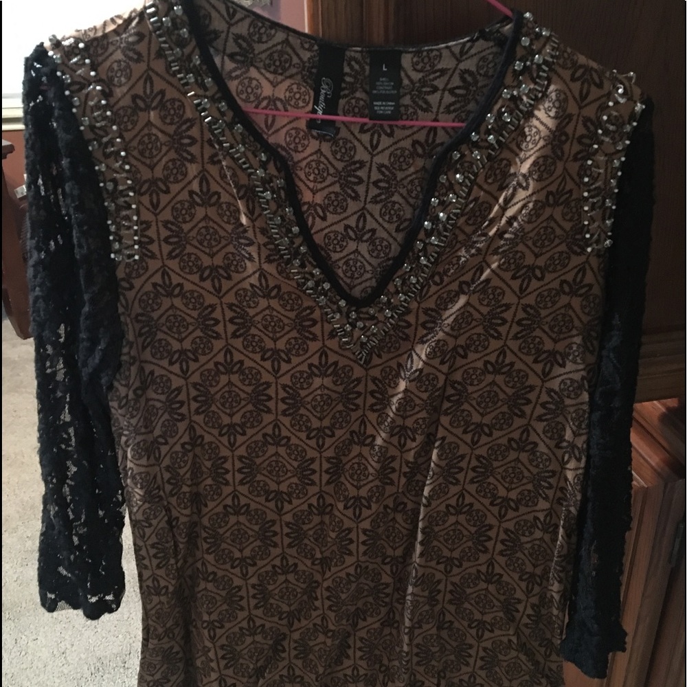 Beaded blouse from Buckle.